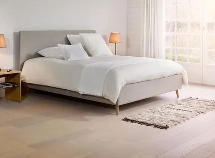 Wat is een goede instaphoogte van een bed?